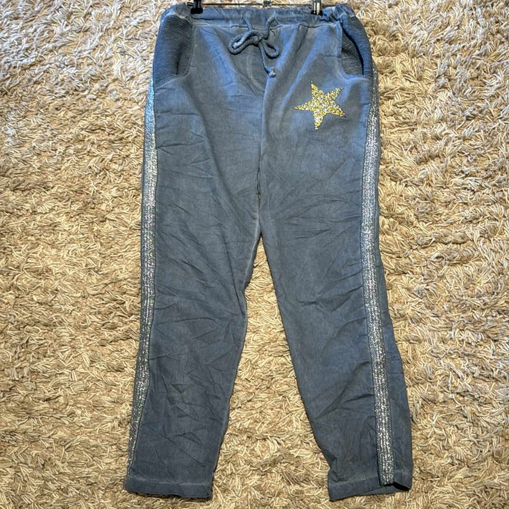 Women's size L jeggings trimmed with silver glitter